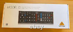 Behringer Model D Analog Synthesizer Module with power supply and 8 patch cables