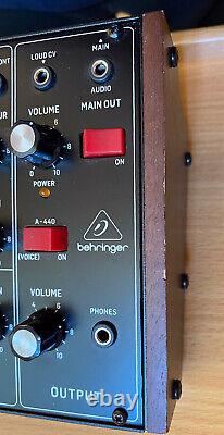 Behringer Model D Analog Synthesizer Module with power supply and 8 patch cables