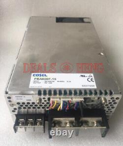 One COSEL PBA600F-15 15V 43A Switching Power Supply Used